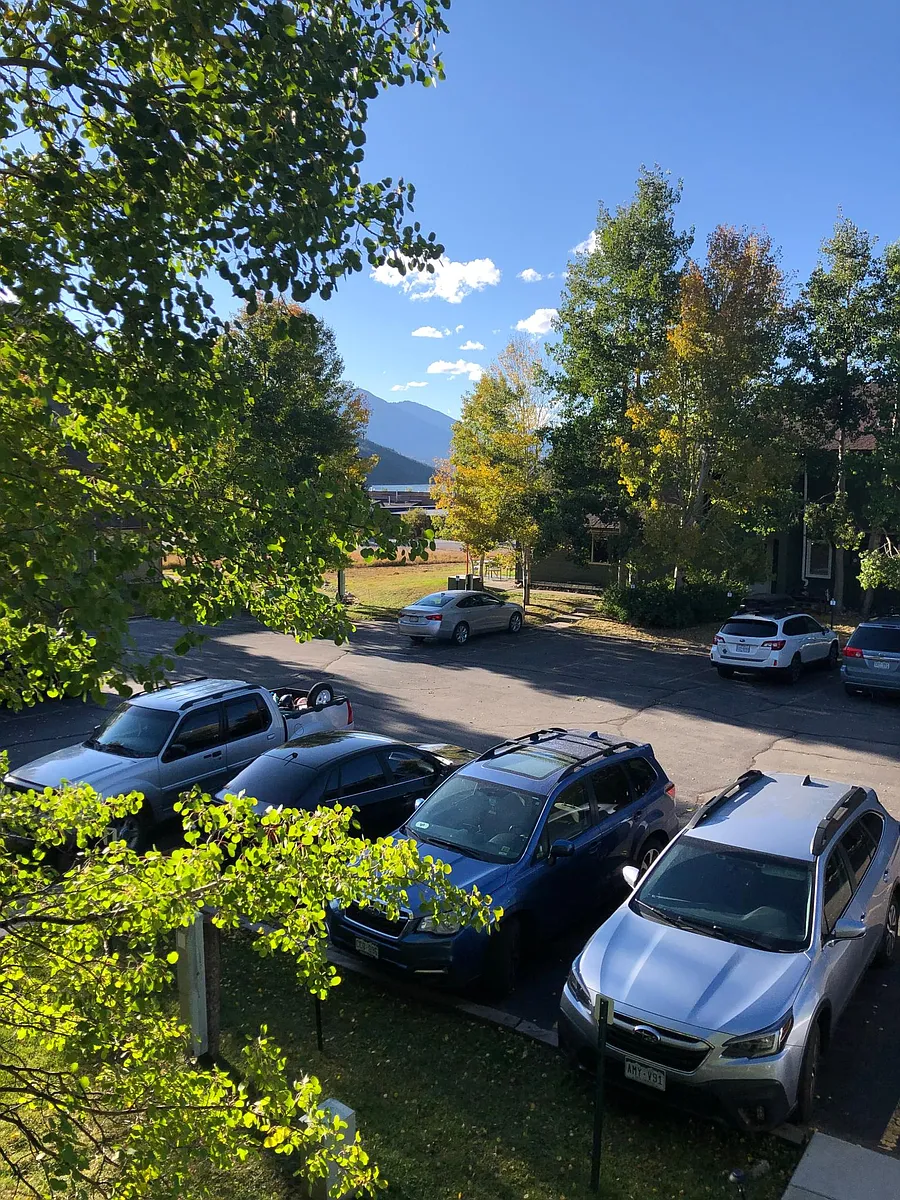 Peekaboo mountain views from upstairs balcony - 256 Cove Blvd #5