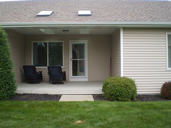 Covered porch in the back of the condo.