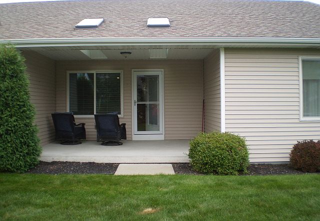 Covered porch in the back of the condo.