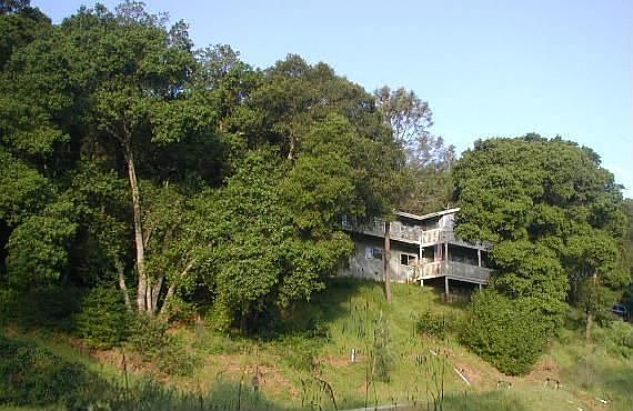 Main Home on Hillside Above Lower Home