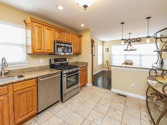 Kitchen w stainless/ Granite