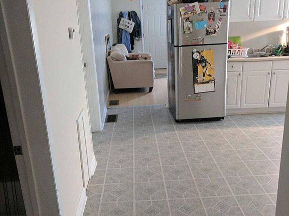 hallway from kitchen towards living room