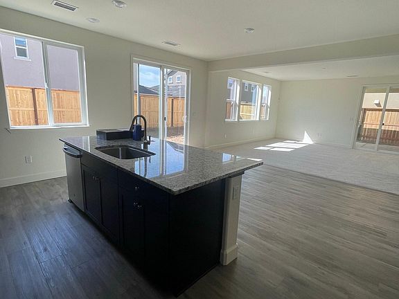 plenty of windows and natural light, the windows all have high end coverings