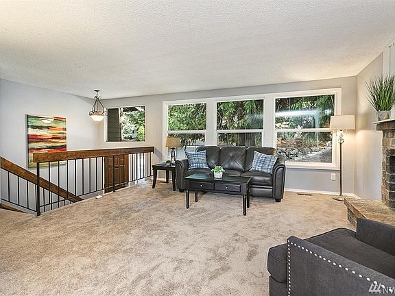 SPLIT LEVEL HOME FEELS OPEN WITH TO THE MID CENTURY RAILS