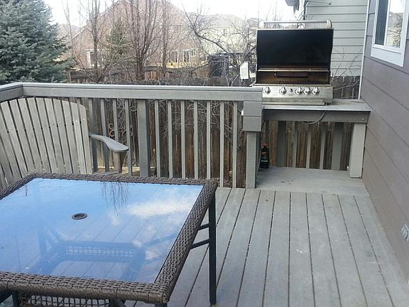 Built in 4-burner grill with rotisserie on Deck