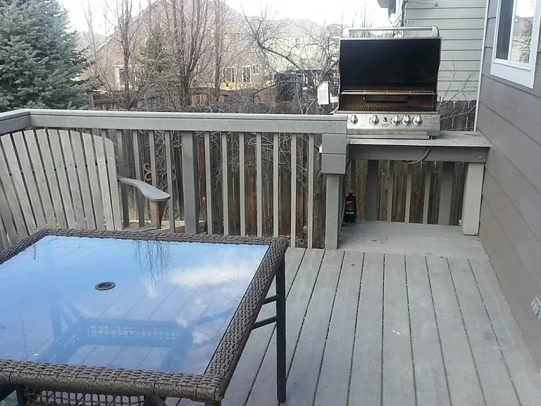 Built in 4-burner grill with rotisserie on Deck