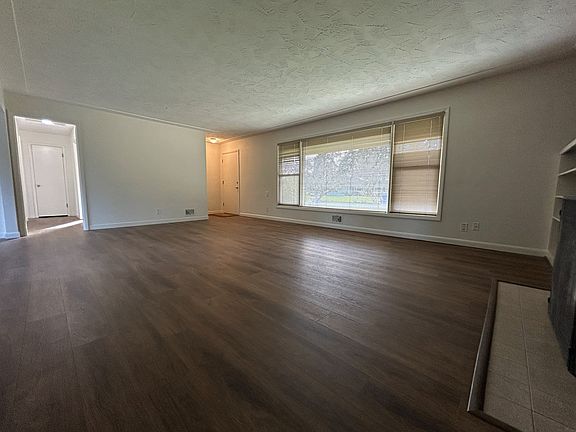 Living room with view toward entry
