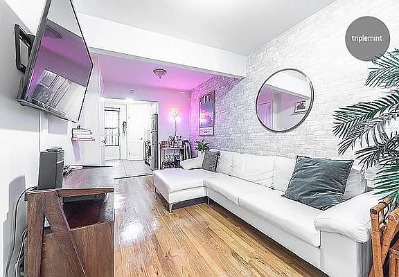 2nd image of 303 E 10th St APT 1