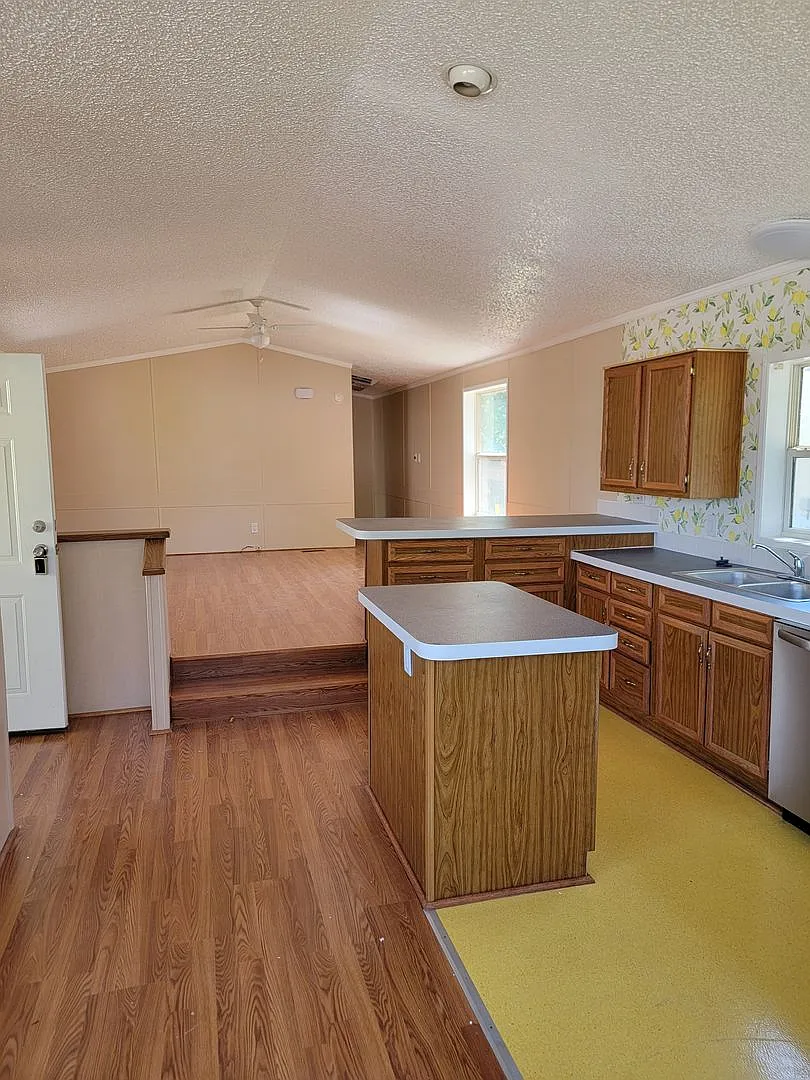 Bright 3-Bed, 2-Bath Home with Yard in 55+ Community! — Photo 3