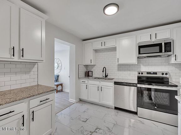 2nd image of 6049 MAPLE LEAF Drive N