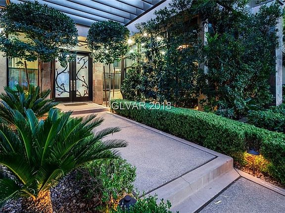 With strong stately architecture, soaring ceilings, imposing fireplace, wood floors and generously proportioned rooms, this gracious and timeless home evokes Old World charm with updated conveniences for today's living.