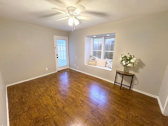 Bedroom 1 with door to back patio