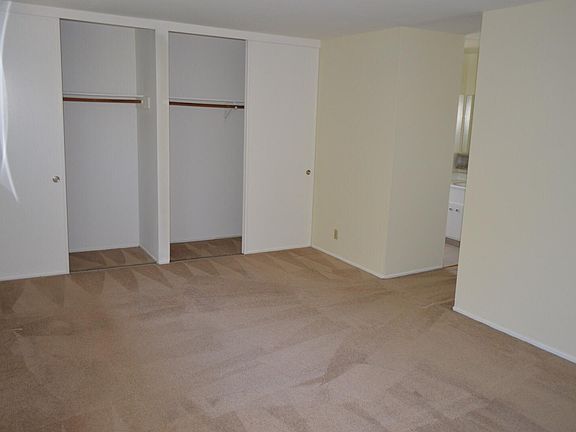 His and Her closet in a large master bedroom