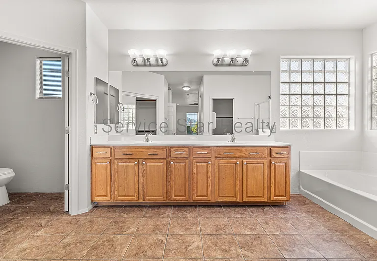 10122 W Albeniz Pl — Photo 28
