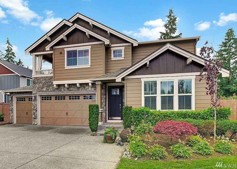 Beautiful, Light-Filled, South-Facing home nestled on a private drive!