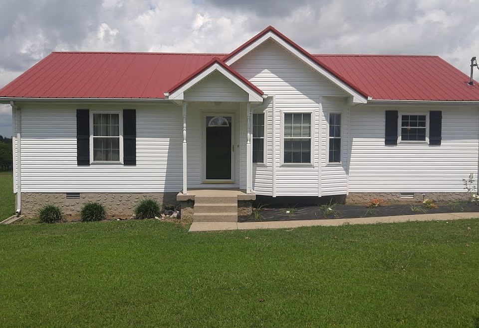 Front of home w metal roof