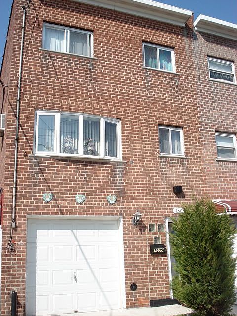 brick semi-detached single family home