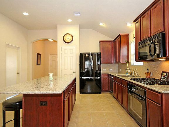42'  UPGRADED CHERRY CABINETS, BACK SPLASH AND HARDWARE