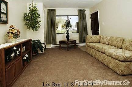 Living room - drapes open
						:
						Area across the street is open area church property, low traffic.