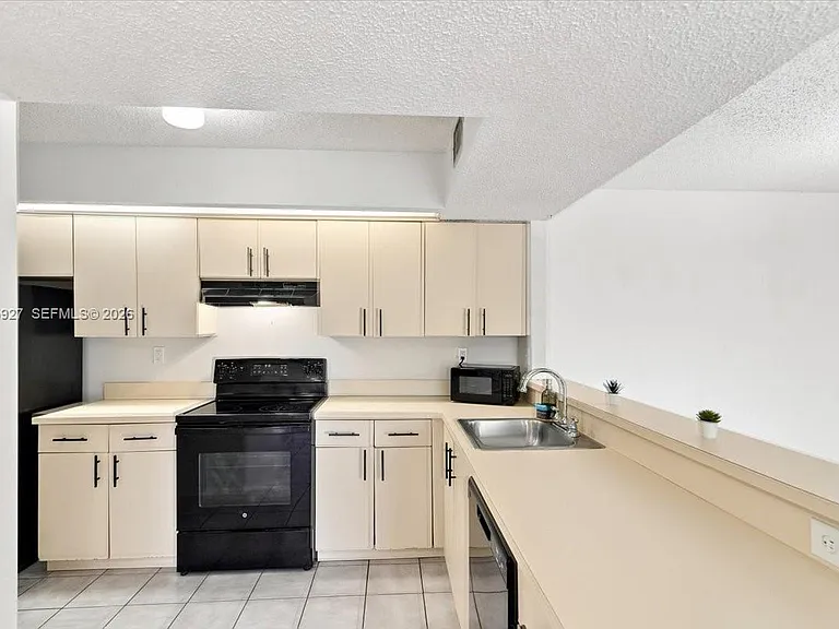 8660 SW 212th St #306 — Photo 9