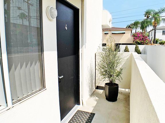 Front Private Patio Entrance , separates you form walkway and gives possibility to leave door open with gate shut