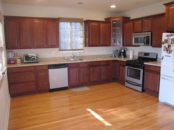 Wow... Cherry Cabs in Large Kitchen