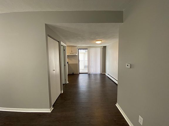 Eat in kitchen with slider to rear deck, next to the kitchen