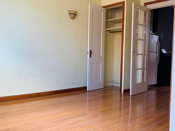 Spacious living room with closet
