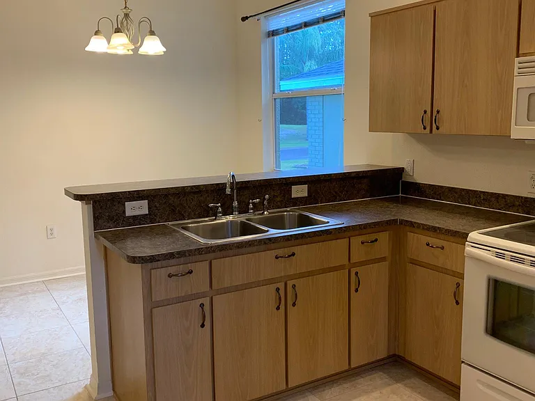 Kitchen overlooking dining area