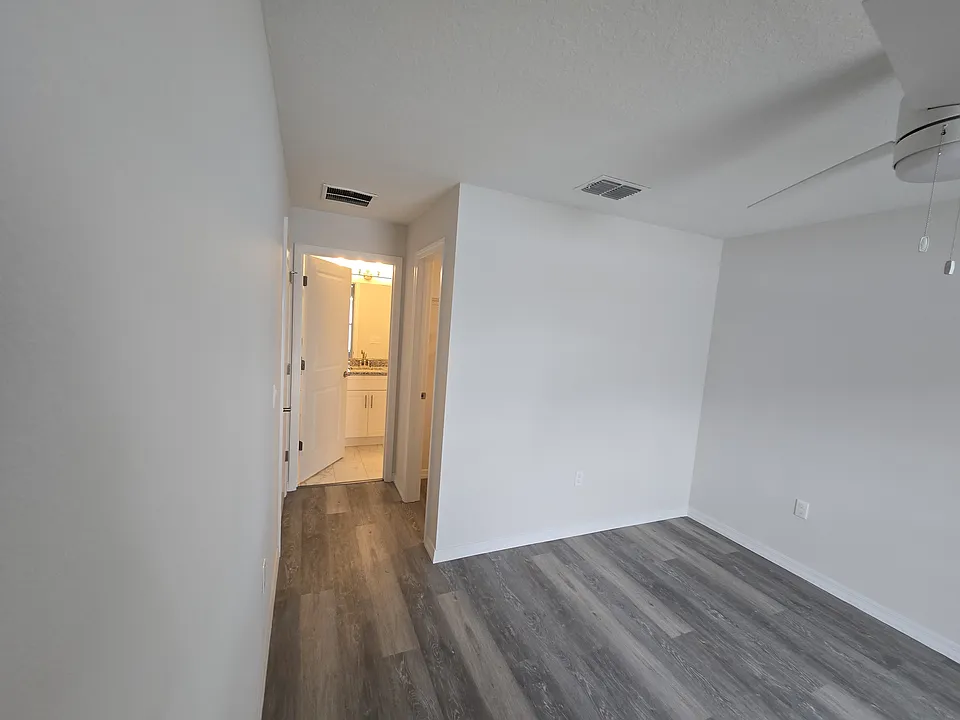 Master bedroom with en-suite bath and walk-in closet.