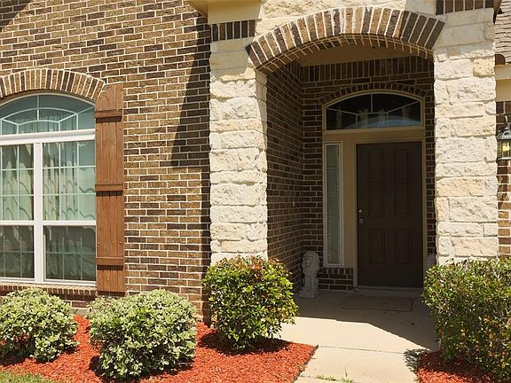 Lovely brick and stone arched entrance.