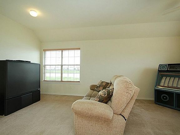 Formal Living / Dining combo currently being used as a gameroom.