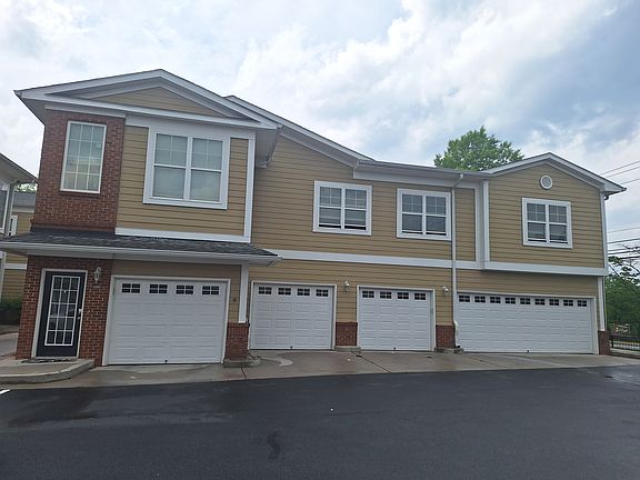 The complete first floor is the unit with the left most garage and entrance.