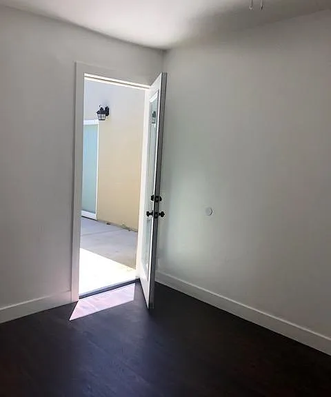 Bedroom 2 with access to Back Patio