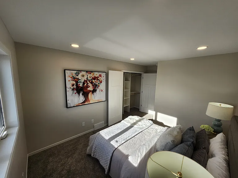 Bedroom two. (Pictures are of another unit with similar finishes and features.)