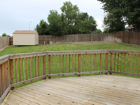 Large backyard with deck