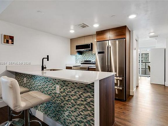 3rd image of 9261 E Bay Harbor Dr Unit 607