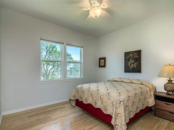 Secondary bedroom has large closet and nice bay view.