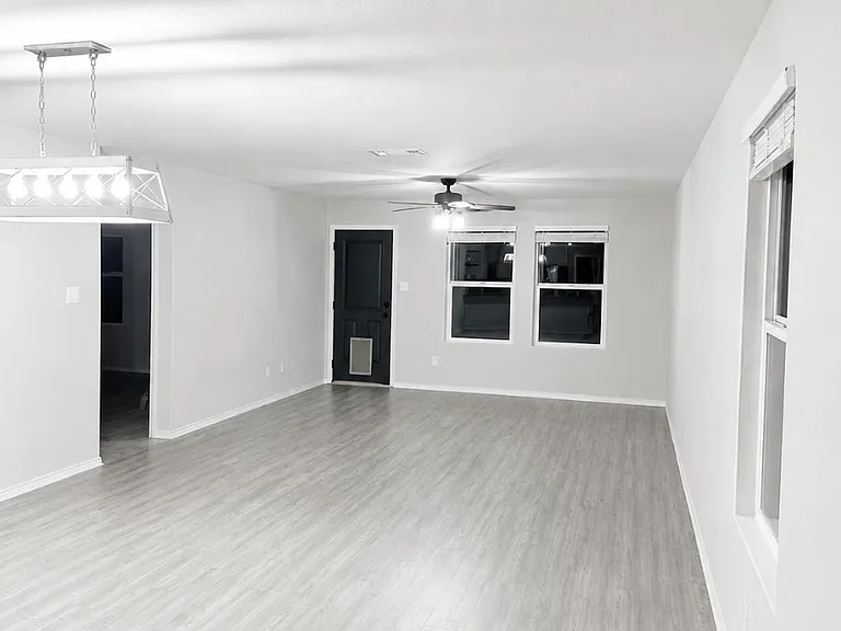 Unfurnished dining room and living room