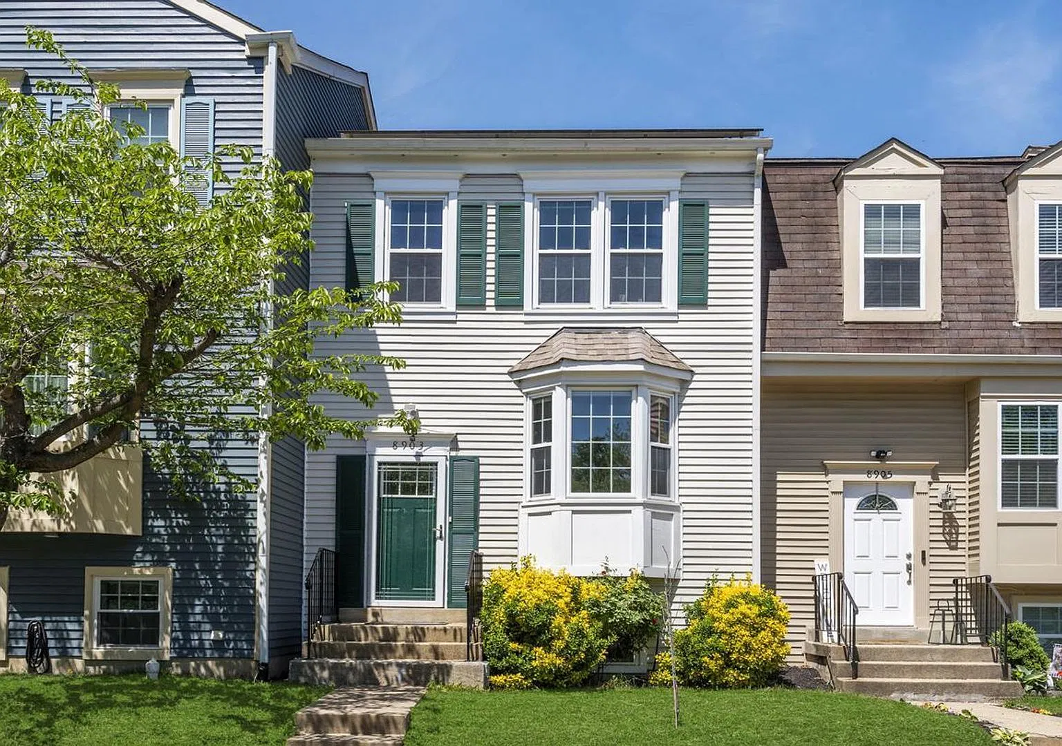 This stunning 3-bedroom, 2-bathroom interior townhome is sure to impress. — Photo 1