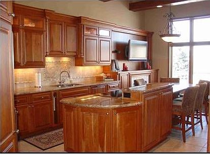 Kitchen has state of the art appliances, cherry cabinetry, granite. 