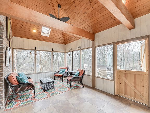 You will love spending time in the large, lighted screened room just off the family room and kitchen