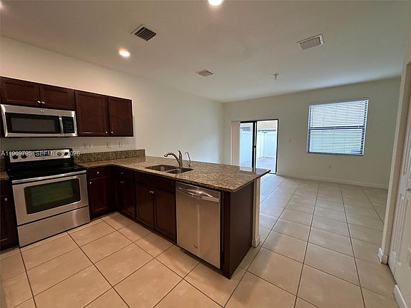 3rd image of 9374 W 32nd Ln