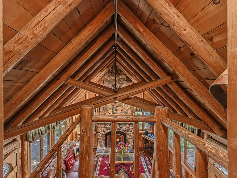 View from upper bedroom looking down on main living area.