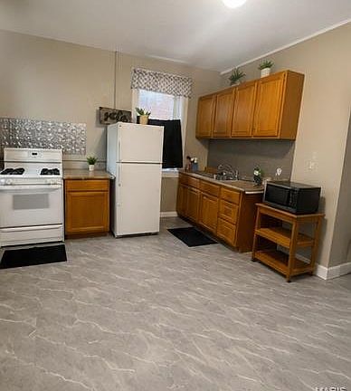 4th image of 6309 Page Ave