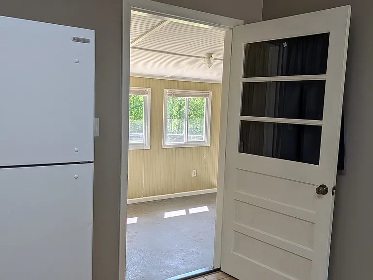 Kitchen door to sunroom