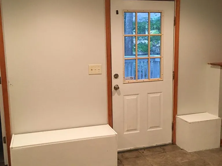 Basement Door Leading to Outdoor Patio.