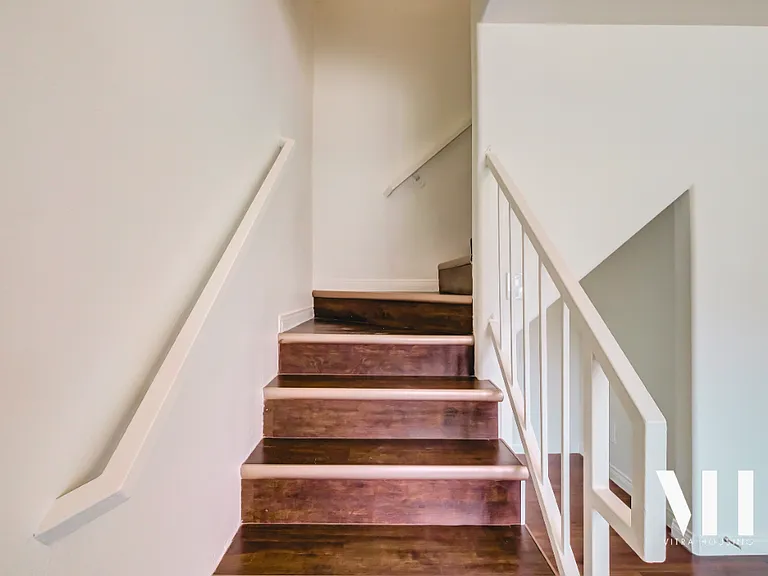 Apt A-E | 3 Bed 2.5 Bath | Half bath on first floor. Hardwood throughout, deck/balcony on 1st floor, private balcony in largest bedroom on second floor. All Stainless appliances, tons of windows, large bedrooms, tons of storage, internet included!