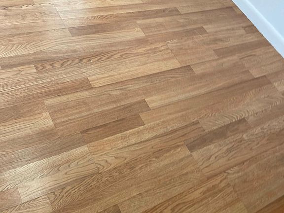 wood floors in living space
tile in kitchen and bathroom