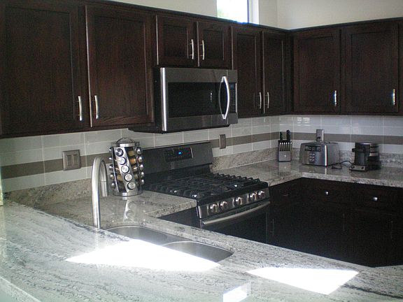 Kitchen w/slab Granite
